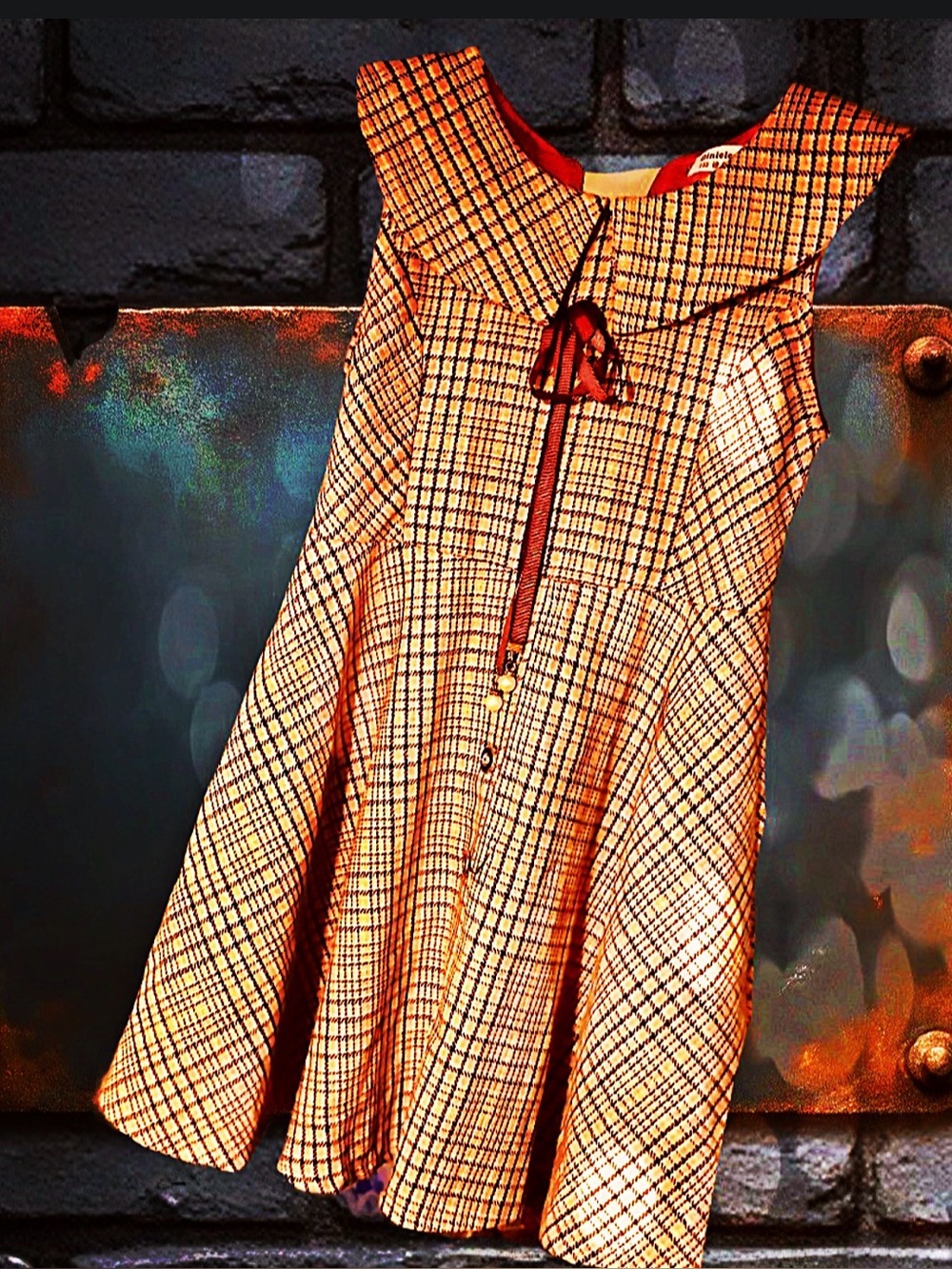Plaid Sleeveless Girl’s Dress with Bow Accent